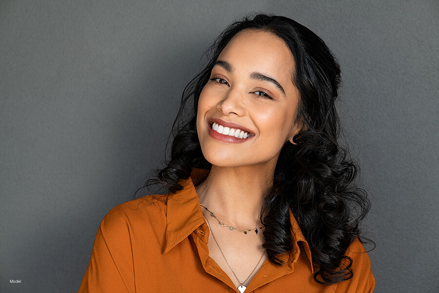 close up on woman's smiling face