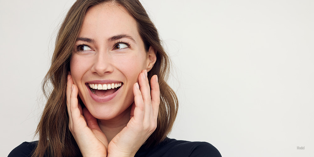 Female with big smile that benefits health and well-being